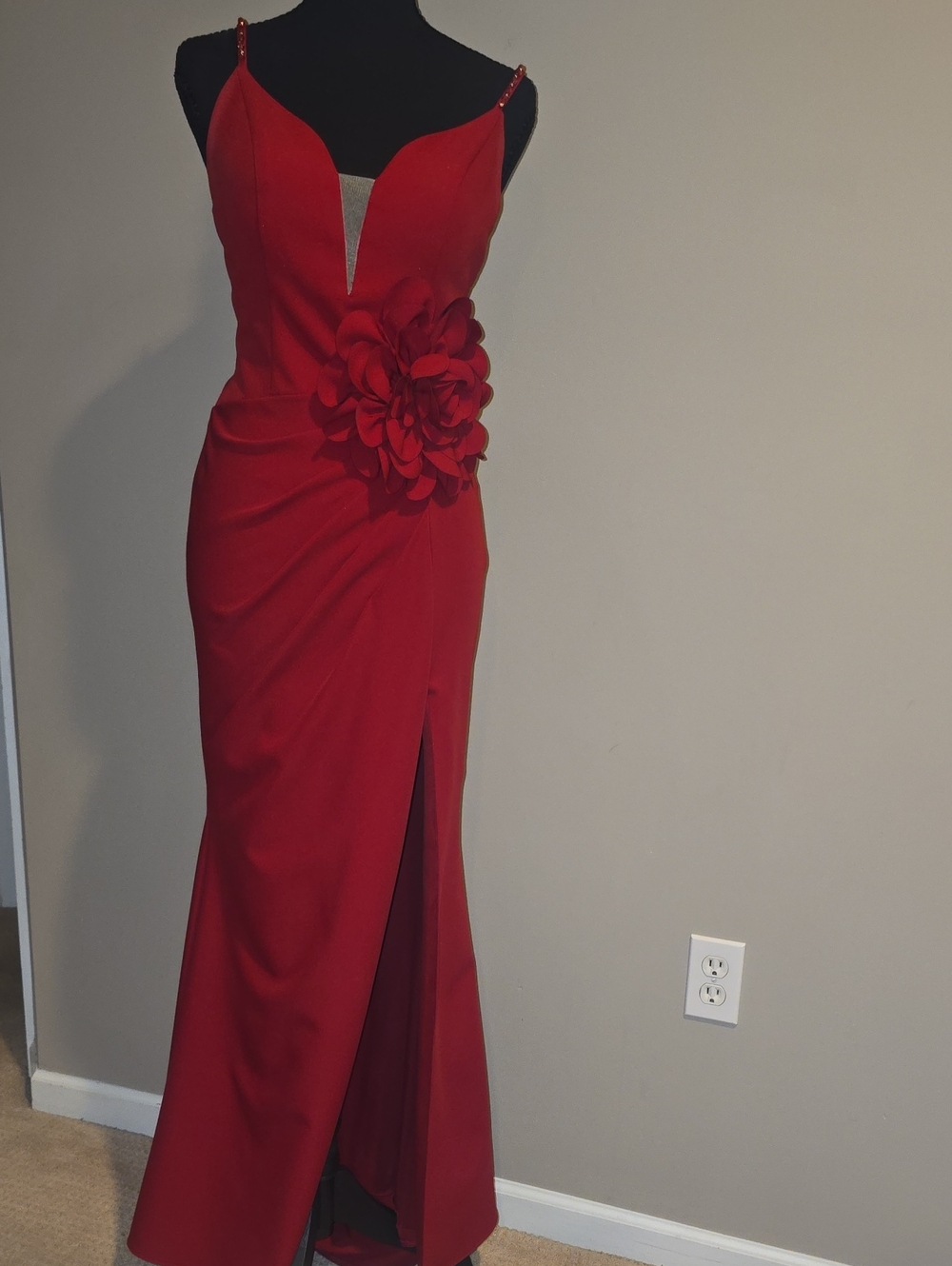 Elegant Red Evening Gown with Floral Accent